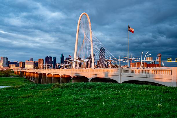 Dallas, TX, USA - 04.06.2025- Downtown Dallas, TX behind the Margaret Hunt Bridge at Dusk