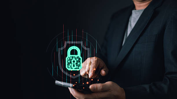istock A person interacts with a smartphone, projecting a glowing digital lock symbolizing cyber protection. The futuristic interface highlights secure data, encryption, and online security measures. 2209026191
