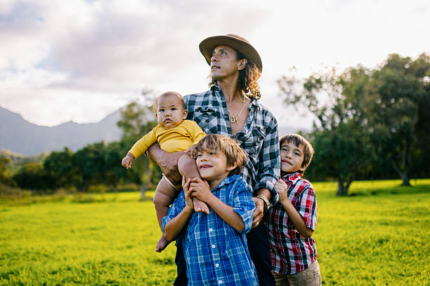 istock Hawaiian Father With His Three Sons 2209027866