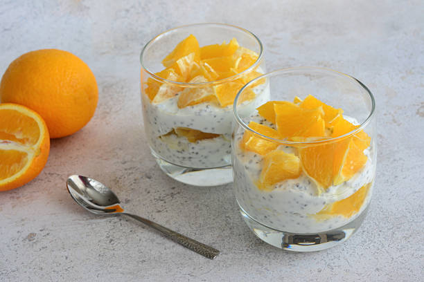istock Chia Seed Pudding with chopped orange fruit in drinking glass 2209029156