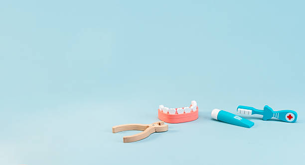 istock Dentist's toy set for children on an isolated background. 2209032403