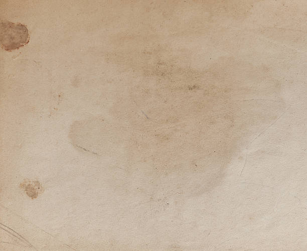 istock Old, worn, and brown paper texture with stains 2209035002