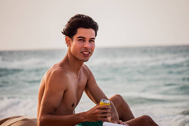 Portrait of young man on the beach