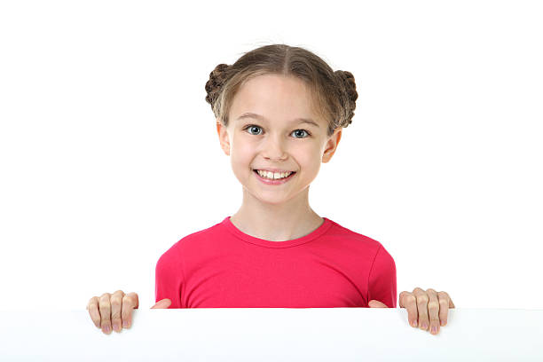 istock Cute young girl holding blank board on white background 2209038346