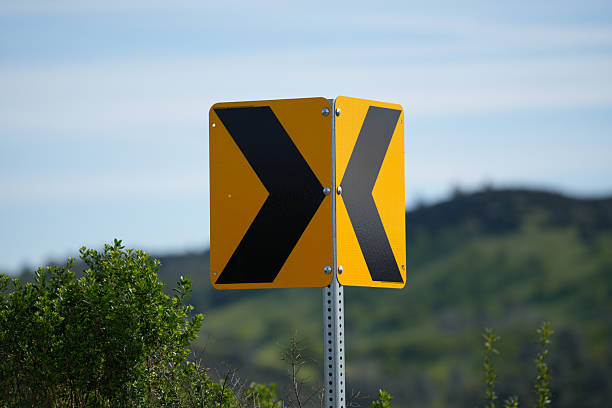 istock Direction Curve Arrow Sign in Scenic Rural Landscape 2209038749