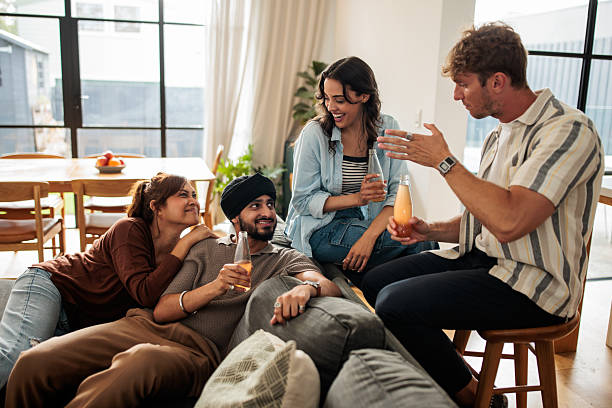 istock Friends Relaxing at Home 2209042687