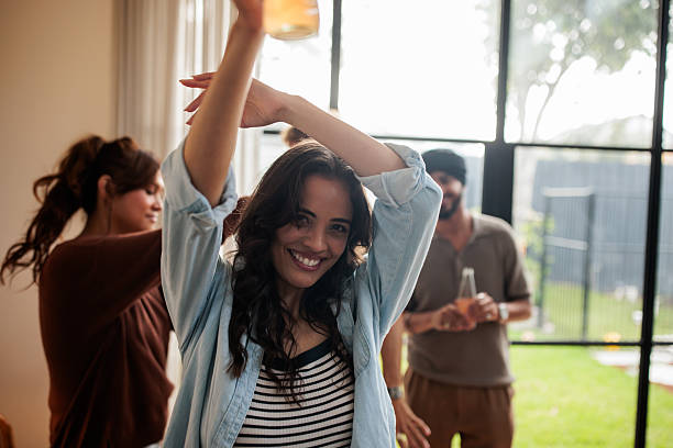 istock Beautiful Woman Dancing at The Party 2209043797