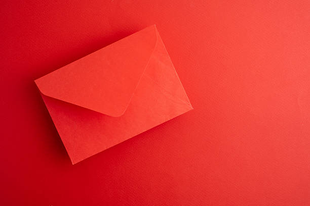 Paper envelopes on a light background. New mail, write a message. Send and receive mail. Postal delivery service. Empty envelope, empty space. Communication with people, paperwork. Envelope close-up