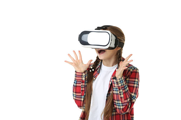 istock Young girl in virtual reality goggles on white background 2209044561