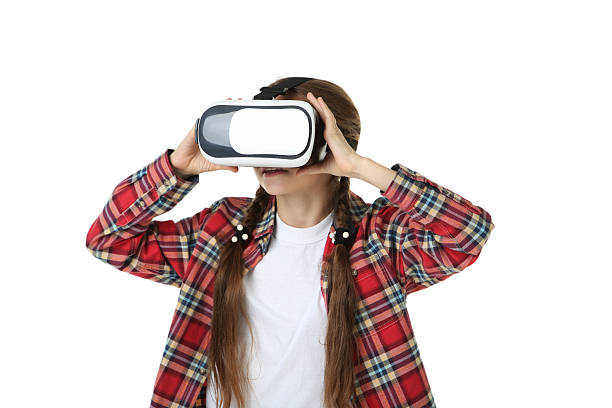 istock Young girl in virtual reality goggles on white background 2209044615