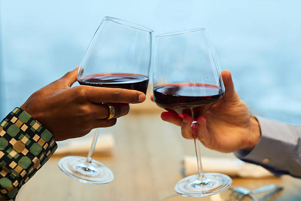 istock Diverse Couple Toasting With Wine 2209044639