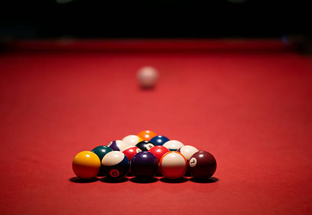 istock Racked biliard balls on biliard table 2209044847