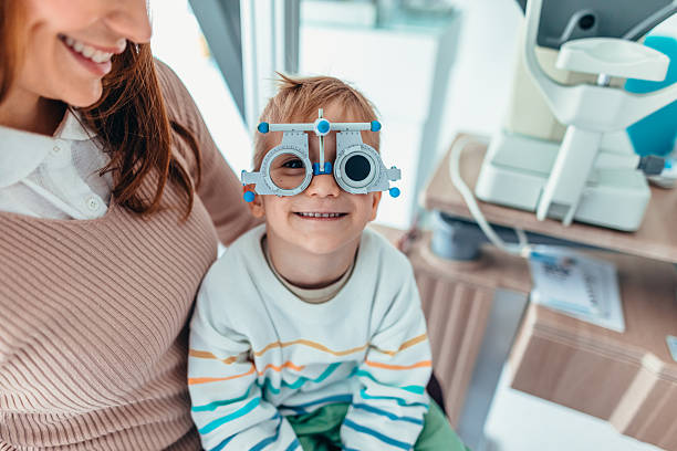 istock Child Undergoing Vision Test While Enjoying a Visit to the Optometrist 2209045695