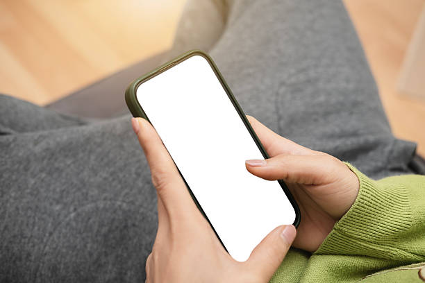 istock hand with smartphone white screen technology and people liftstyle. 2209059109