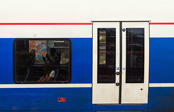 Commuter train arriving on the railway station