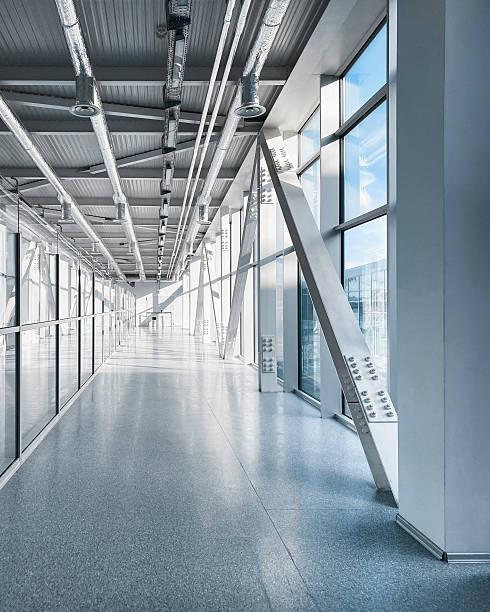 istock Empty long corridor in the airport terminal. 2209063923