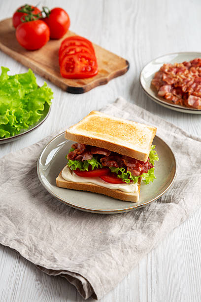 istock Homemade BLT Sandwich (Bacon, Lettuce and Tomato) on a Plate, side view. 2209069347