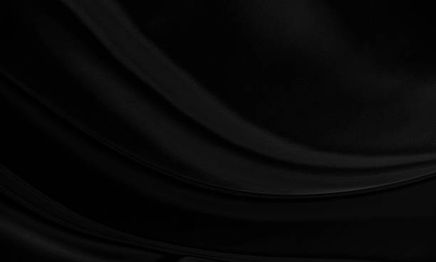 istock Black gray satin dark fabric texture luxurious shiny that is abstract silk cloth background with patterns soft waves blur beautiful. 2209070616