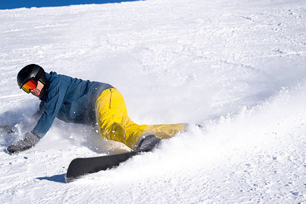 istock Snowboarder descends mountain, Swiss Alps 2209076859