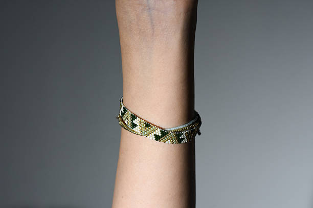 istock Minimal Miyuki Bracelet on Bare Wrist 2209076900
