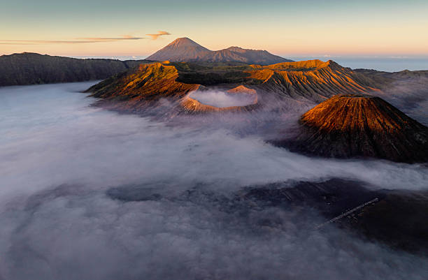 istock Morning Serenity: Mist Enveloping the Village Near Mount Bromo 2209077778