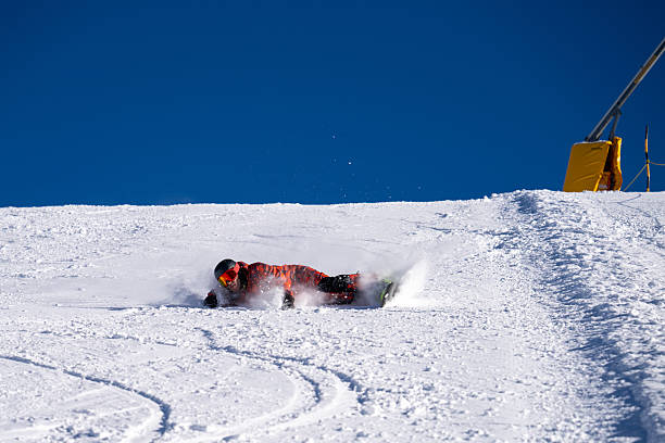 istock Snowboarder descends mountain, Swiss Alps 2209079119