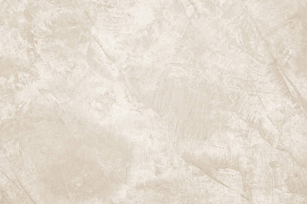istock Colour old concrete wall texture background. Close up retro plain cream color cement wall background texture. Design paper vintage parchment element. 2209082439