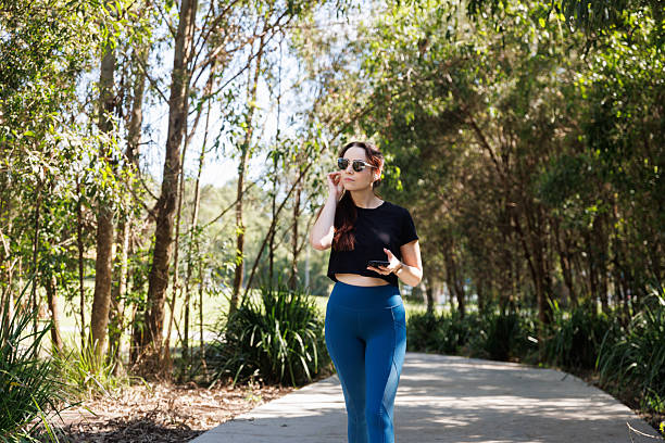 istock Young teacher taking time out to go for a walk after school 2209083718