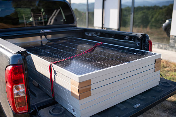 solar panels loaded in truck.