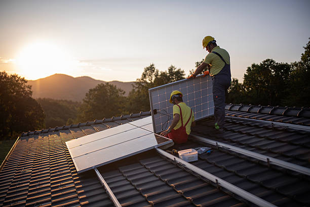 istock Installing solar panels on roof house. 2209090654