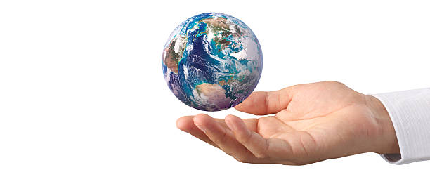 istock Globe ,earth in human hand, holding our planet glowing. Earth image provided by Nasa 2209091082