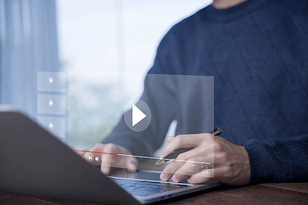 istock multimedia OTT, content on digital technology. concept of watching live video streams on a computer laptop 2209094696