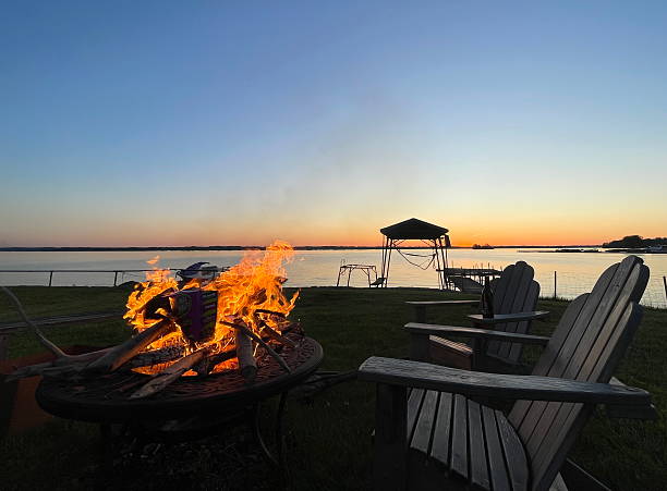 istock Lakeside Campfire at Peaceful Sunset 2209095293