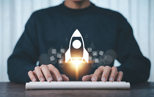 istock Businessman and rocket start flying up and network line connection. Startup concept Planning and starting corporate business start up, Rocket soars with speed to hit the growth target. 2209103838