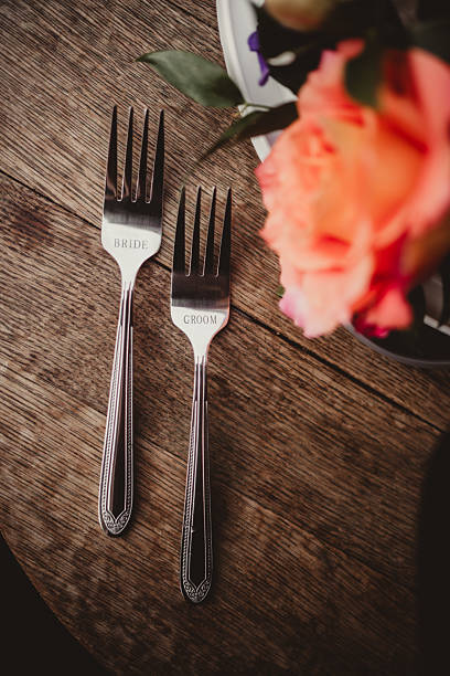 Engraved forks for bride and groom wedding cake