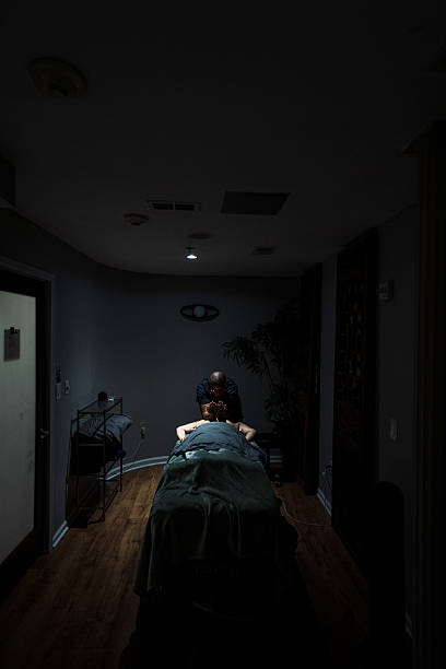 istock Massage therapist working at luxury spa 2209106179