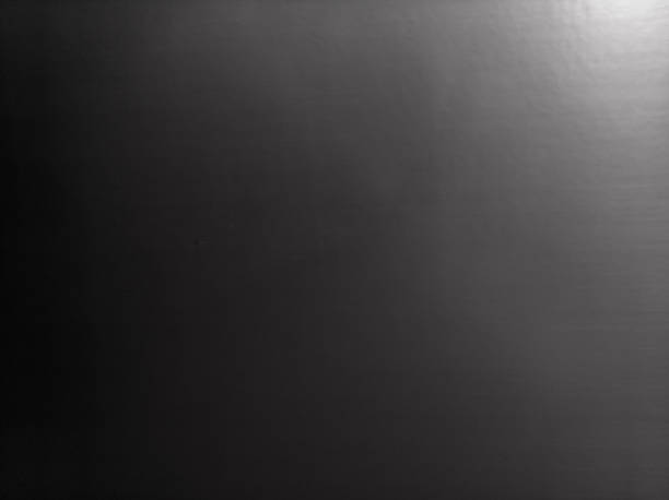 istock Blurred background of black and grey metal texture with gradient 2209108114