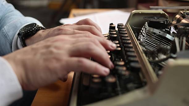 istock Typewriter, writer or journalist, cinematic style 2209111193