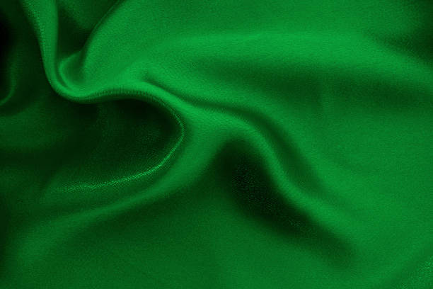 istock Green emerald fabric texture background, detail of silk or linen pattern. 2209111771