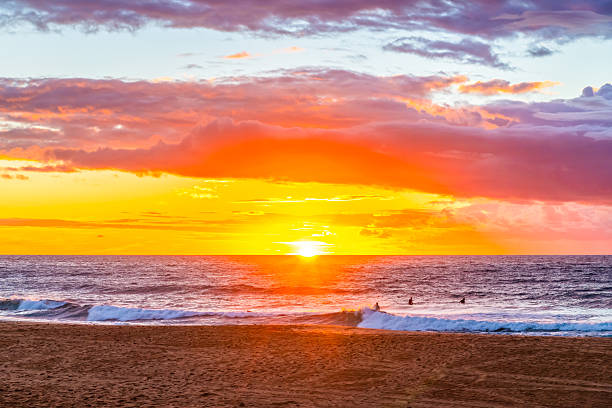 Sunrise Seascape with rain clouds at Bilgola Beach on the Northern Beaches of Sydney, NSW, Australia.