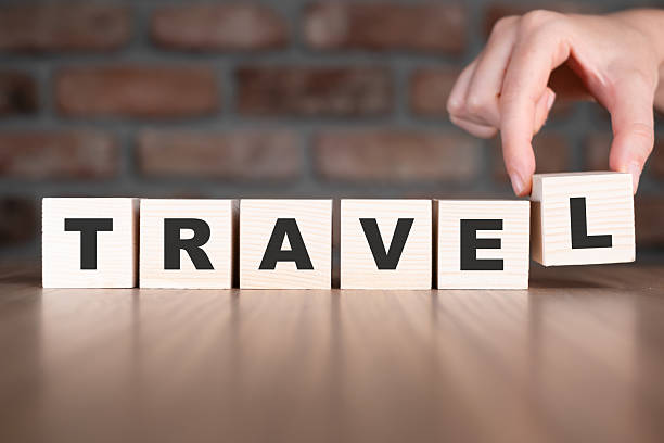 istock Travel word with wooden blocks on table 2209112416