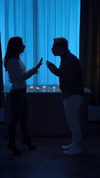 istock A couple having an intense argument by candlelight 2209116736