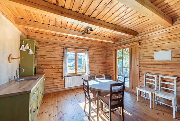 istock Rustic Wooden Home Dining Room with Natural Light and Cozy Interior Decor 2209124308