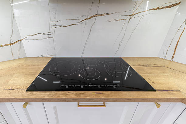 istock Modern Induction Cooktop on Wooden Countertop 2209130605