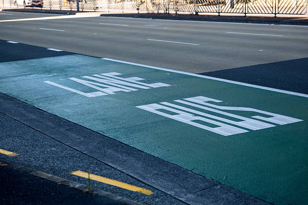 istock Bus lane road sign painted on asphalt 2209132100