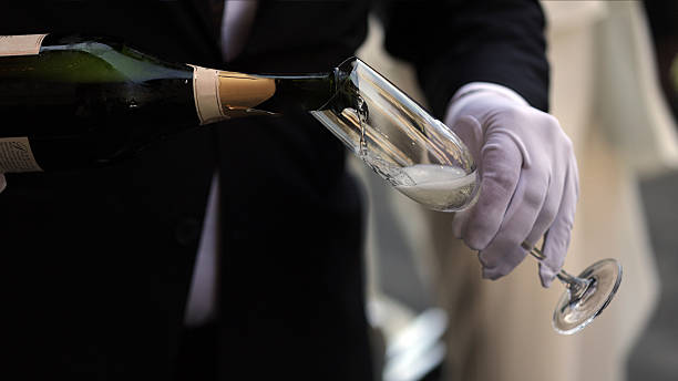 istock Luxury Celebration Moment. Elegant Champagne Service at a Formal Event. 2209139321