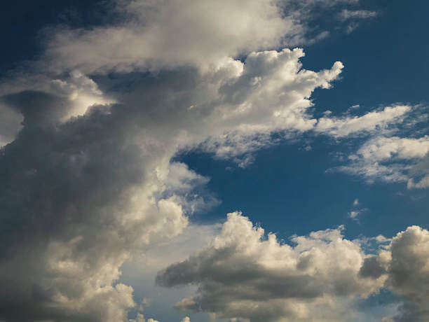 istock Dark rain cloud dramatic sky summer tropical thunder storm sky and fluffy black darkness cloud nearly raining cloudscape. Nimbus raincloud skyline climate background. Dark gray sky cloudy environment 2209140061