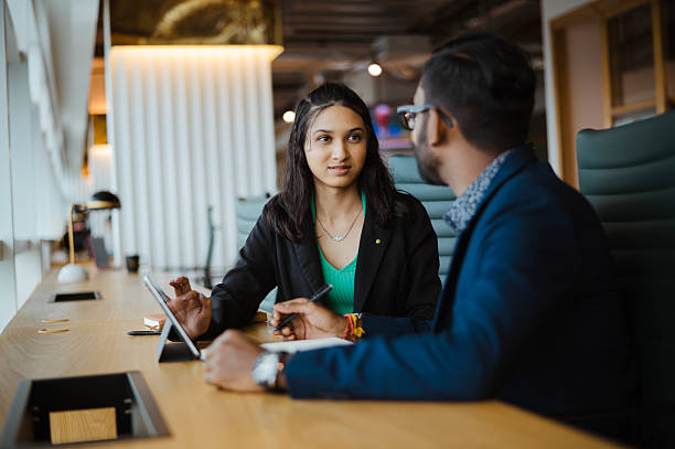 istock Business Meeting in a Modern Office Setting 2209141090