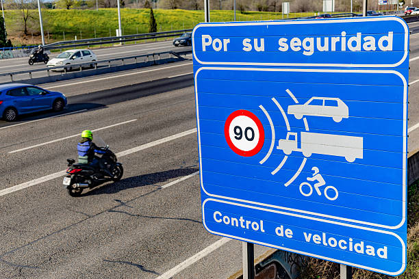 Speed control sign showing 90 km/h speed limit on highway