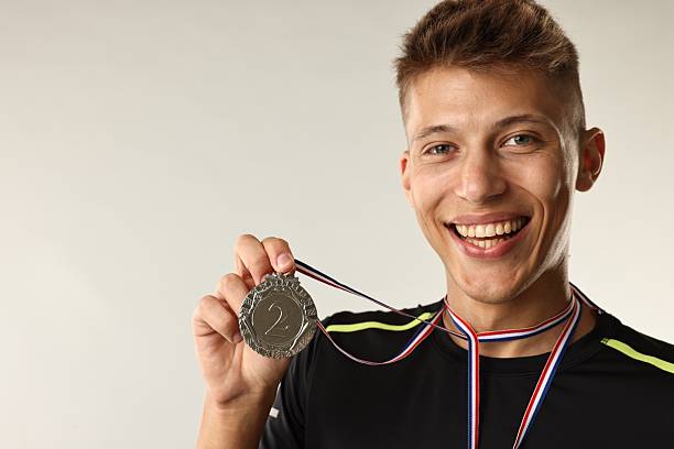 istock Happy winner with silver medal on light grey background. Space for text 2209149410